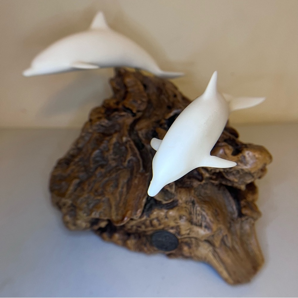 Vintage John Perry Dolphin Sculptures on Burlwood